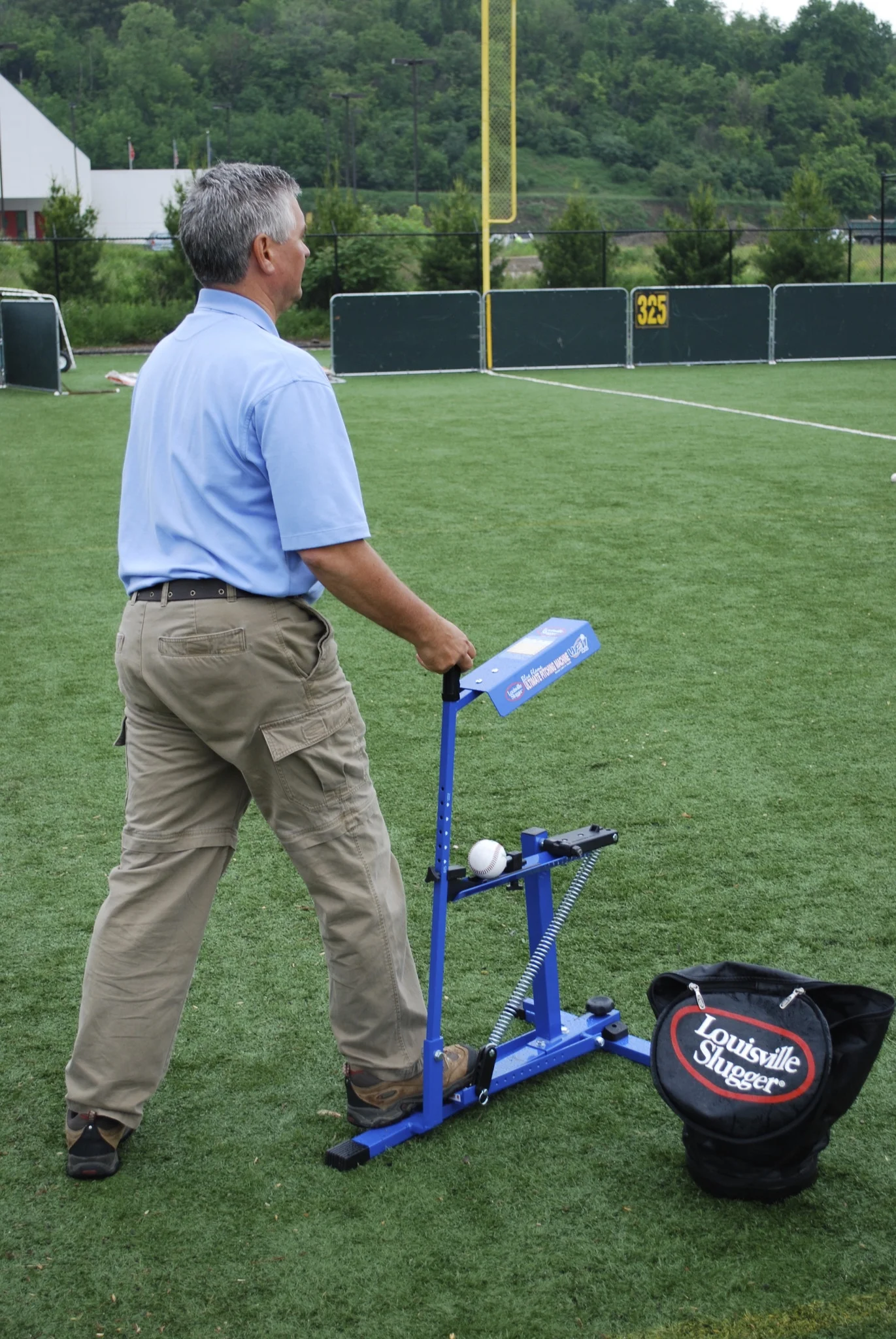 Louisville Slugger Blue Flame Pitching Machine – Manual Baseball & Softball Trainer, Throws Up to 60 MPH, Youth & Adult Practice Tool